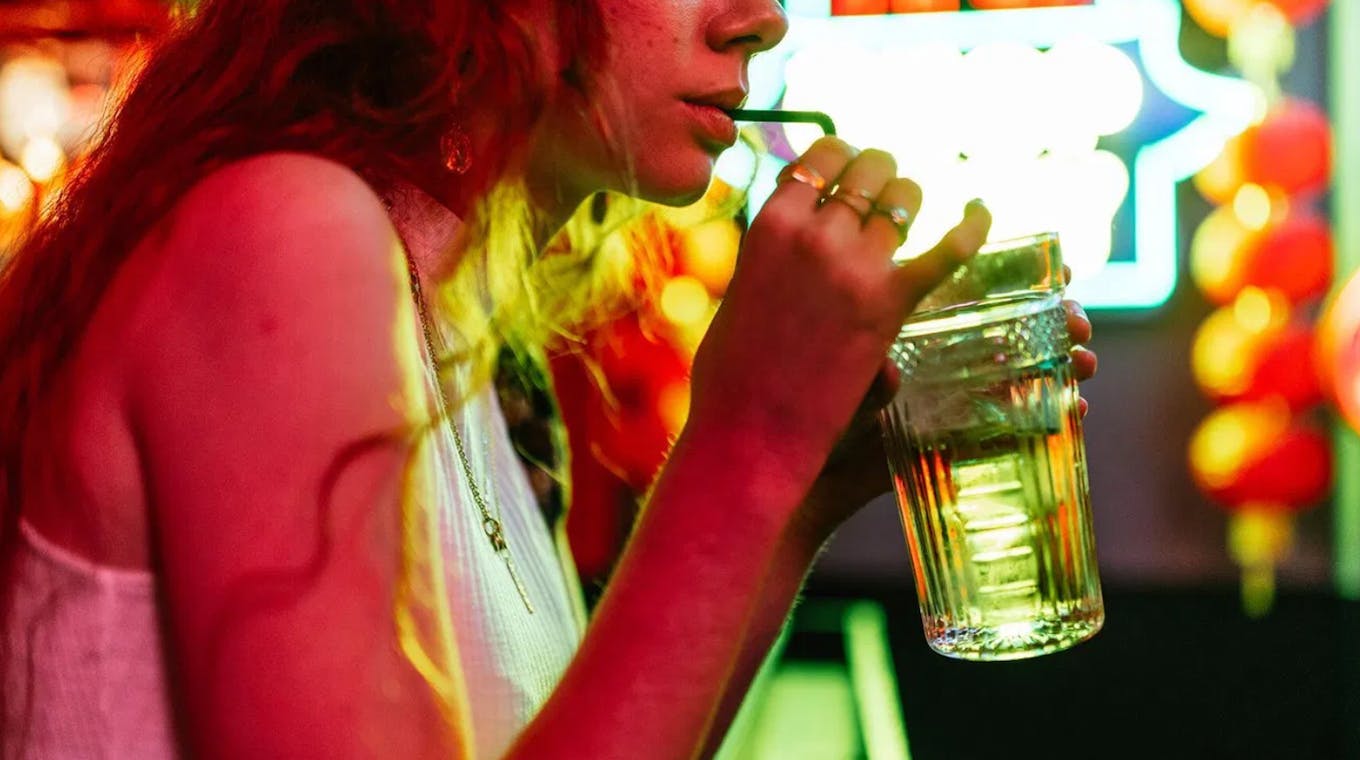 Woman drinking alcohol